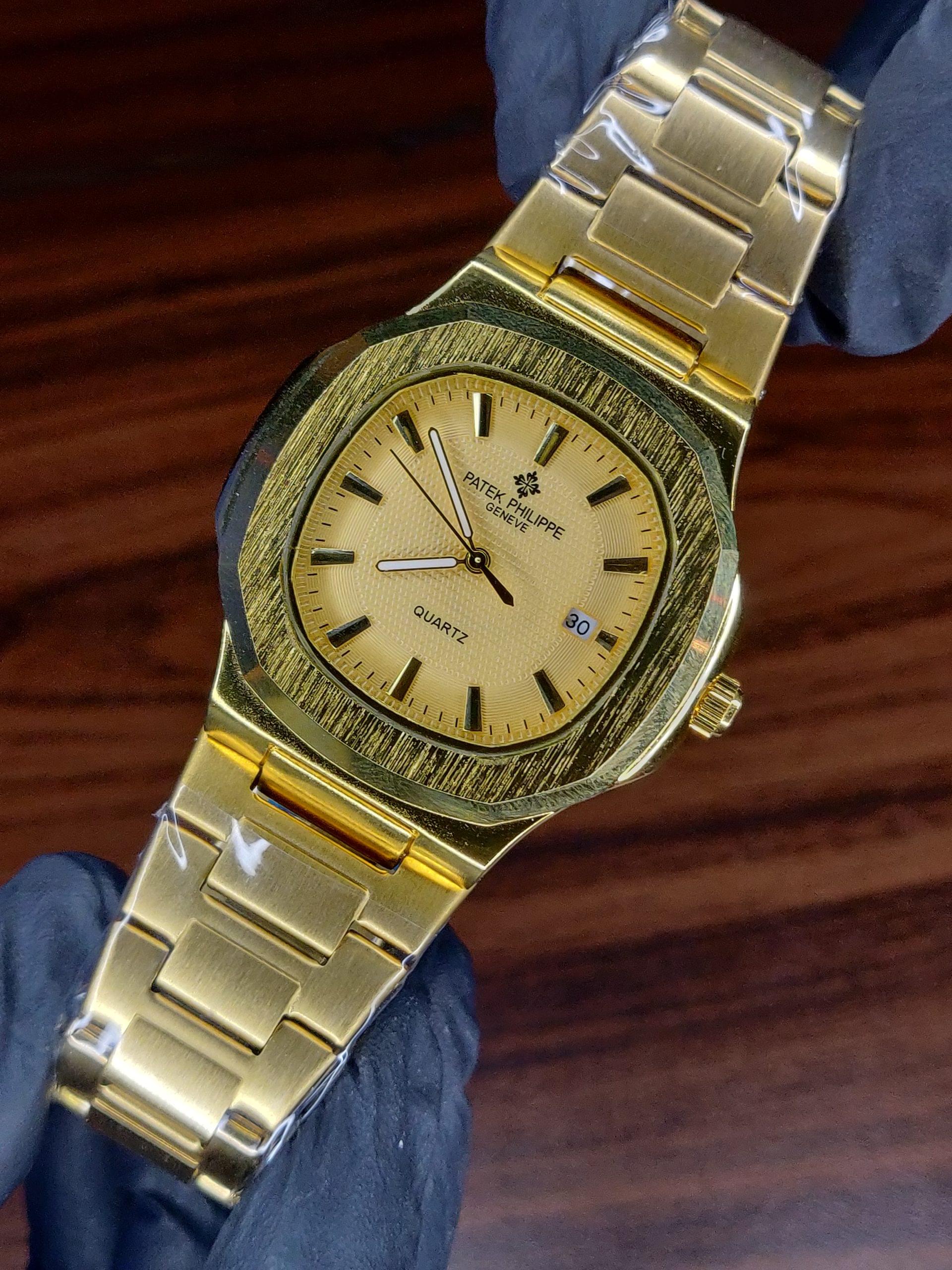 Patek Philippe Nautilus Quartz Gold Watch