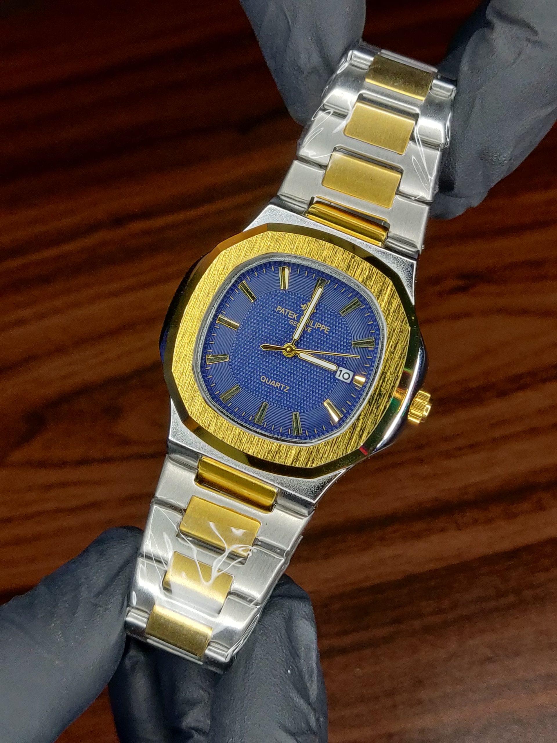Patek Philippe Nautilus Quartz Two-Tone Watch with Blue Dial – Luxury Redefined